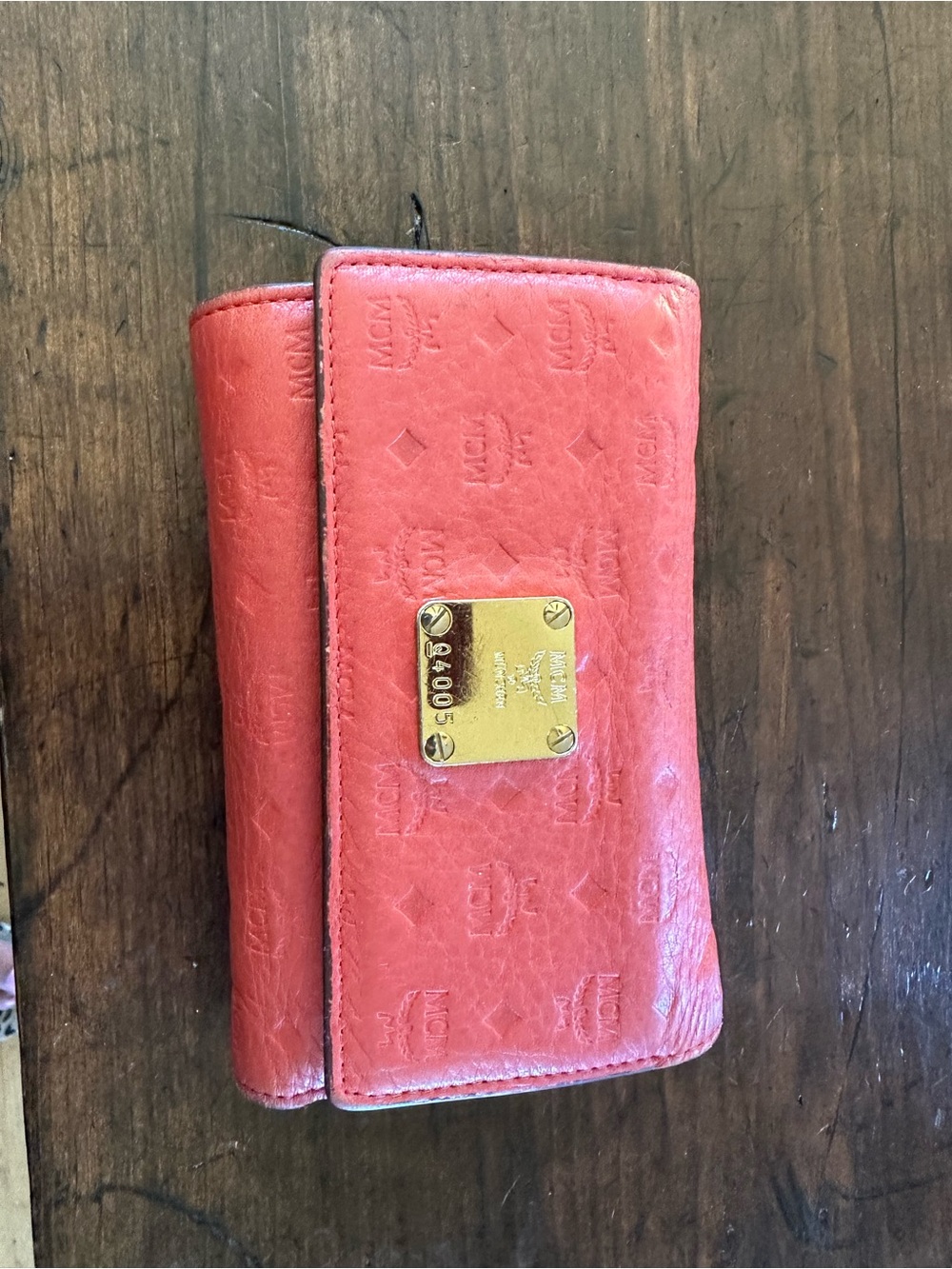 MCM Coral Leather Wallet with Gold Plaque